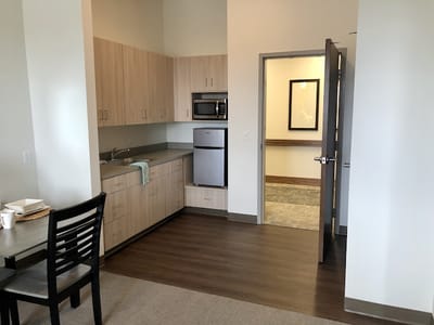 Interior view of a resident room with kitchen area