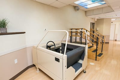 Rehabilitation equipment in a well-lit interior space