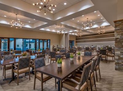 Bright dining room with ample seating and modern decor