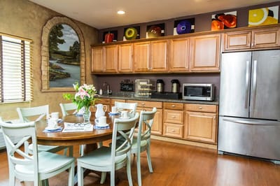Bright dining area with a table set for meals