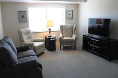 Cozy living area with seating and television
