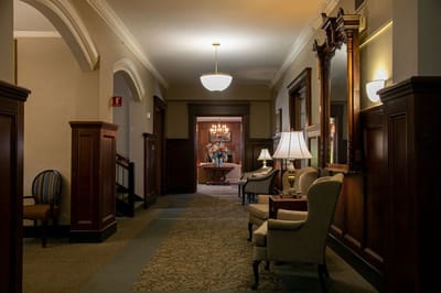 Interior hallway with seating and decorative elements