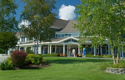 Entrance of Park Residences of Waterville with staff and residents
