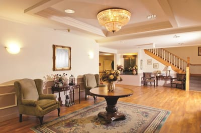 Lounge area with seating and decorative lighting