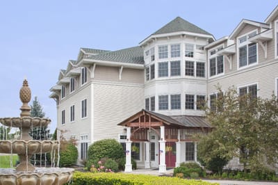 Exterior view of Partridge House showcasing the entrance and landscaping
