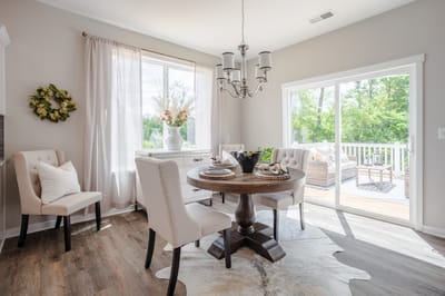 Bright dining area with natural light and elegant decor