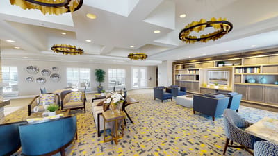 Bright common area with comfortable seating and decor