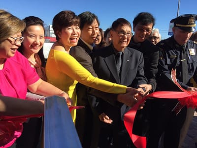 Celebration ribbon-cutting with community members