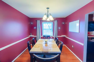 Cozy dining room with a wooden table and chairs