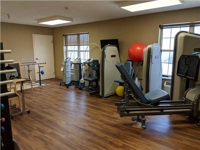 Interior view of a fitness room with exercise equipment