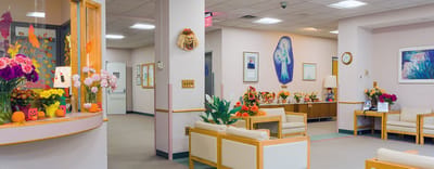 Common area with seating and floral decorations
