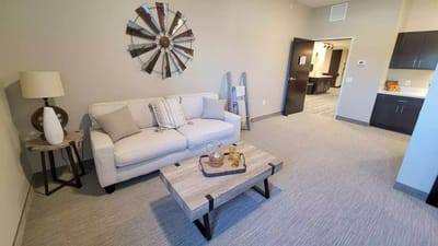 A cozy interior living space with sofa and decor