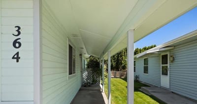 Covered walkway leading to resident rooms