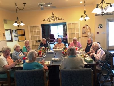 Residents enjoying lunch in a dining room
