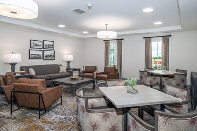 Common area with comfortable seating and tables