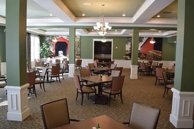 Interior view of a dining area with tables and chairs