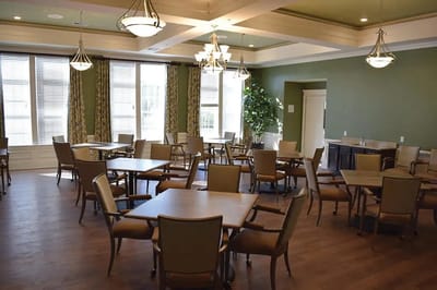 Bright dining room with tables and chairs