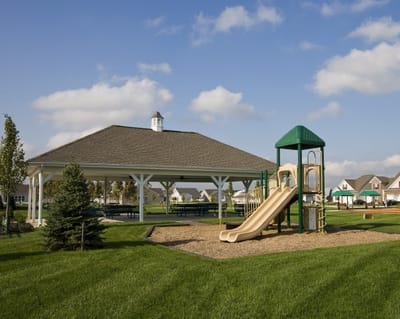 Outdoor recreational space with a gazebo and playground