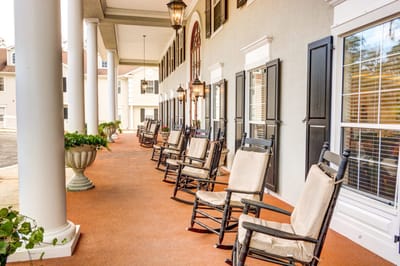 Outdoor seating area with rocking chairs on a porch