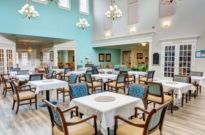 Bright dining room with tables and chairs