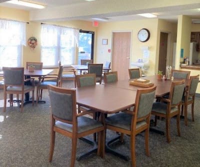 Bright dining area with tables and chairs