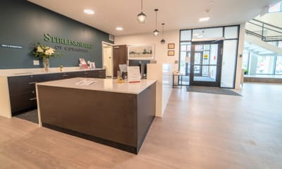 Bright and welcoming reception area inside Stirlingshire of Coralville