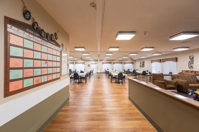 Interior view of a dining area with tables and seating