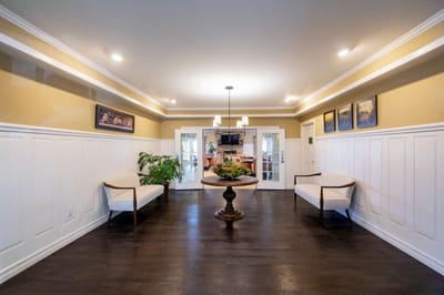 Interior common area with seating and decorative elements