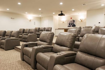 Comfortable cinema seating in a cozy screening room