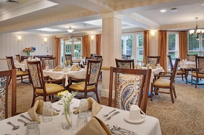 Dining area with tables set for a meal