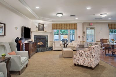 Cozy common area with seating and a fireplace