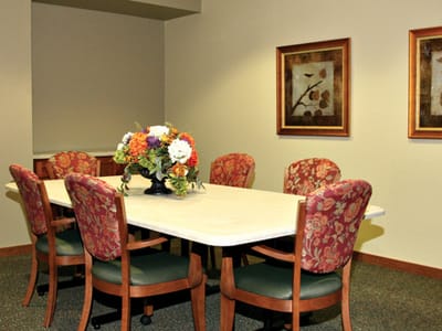Cozy dining area with a flower centerpiece