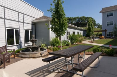 Beautiful outdoor space with a fountain and seating area