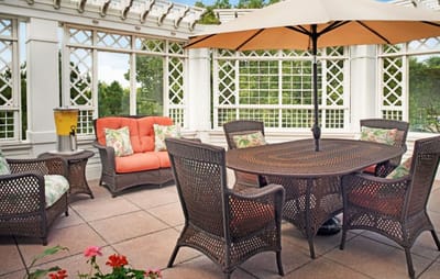 Outdoor seating area with a patio umbrella