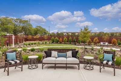 Outdoor seating area with garden view