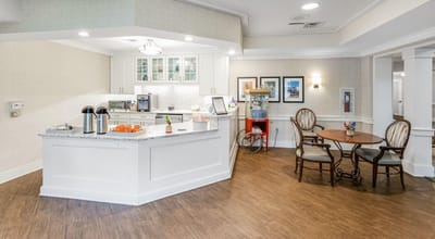 Bright common area with seating and fresh decor