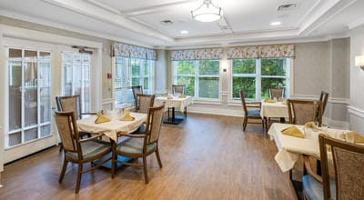 Bright dining area with neatly set tables