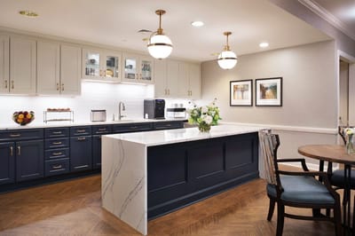 Bright kitchen area with modern appliances and decor