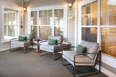 Cozy seating area in a common room with natural light