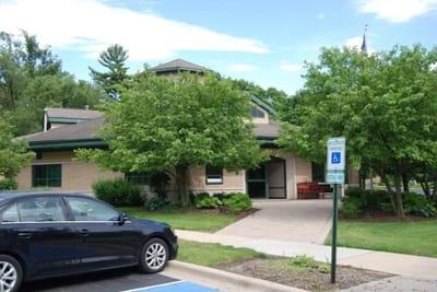 Exterior view of the Tabor Hills facility with a parking area