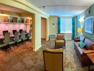 Interior common area with seating and workstations