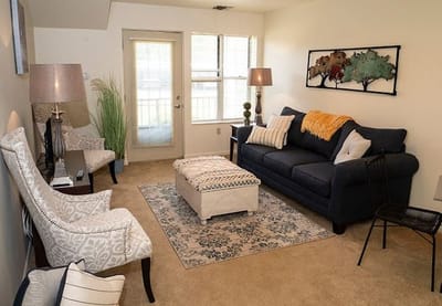 Bright and inviting living room with a cozy sofa