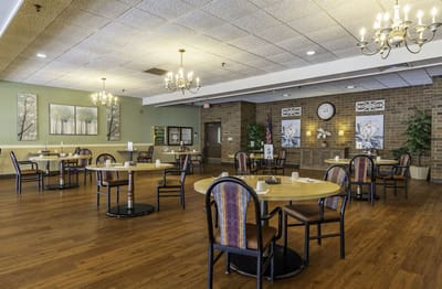 Bright dining room with tables and chairs
