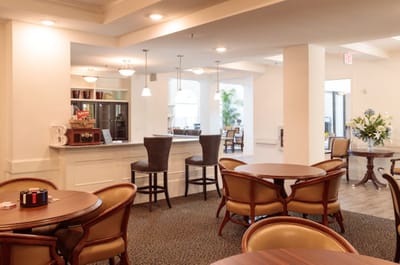 Bright common area with tables and chairs