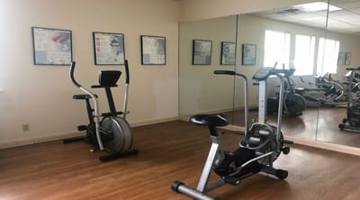 Interior view of a fitness area with exercise equipment