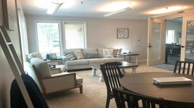Cozy common area with seating and natural light