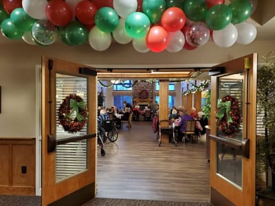 Residents enjoying a festive gathering in the dining area