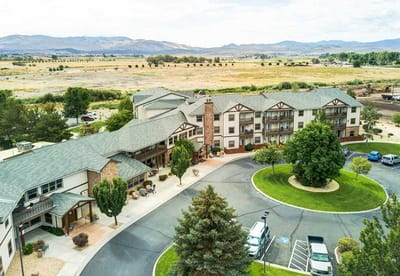Aerial view of The Chateau at Gardnerville with landscaped grounds