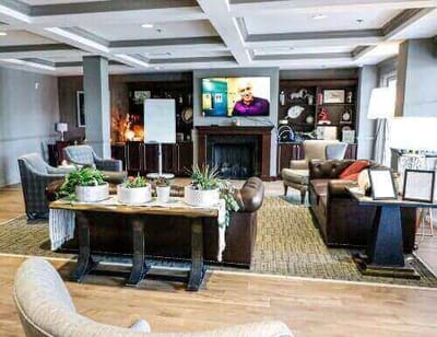 Comfortable common area with seating and a television