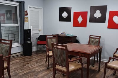 Interior view of a common area with tables and chairs